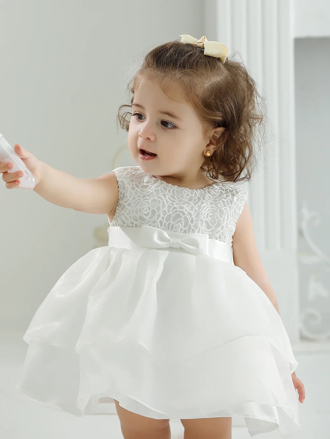 Elegant Sara-Marie White Tiered Baby Dress