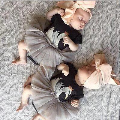 Adorable babies in matching outfits from the Fantastic Sets collection, featuring playful designs and fluffy tutus perfect for little girls. Discover charming styles for your child with our Fantastic Sets!