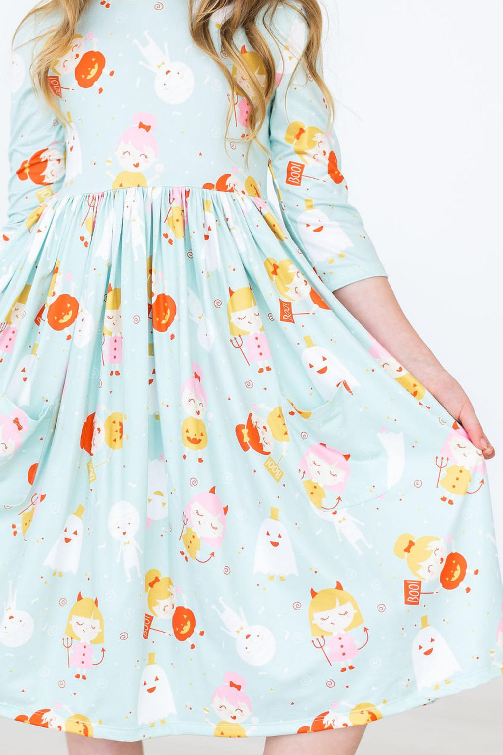 Ghouls Just Want to Have Fun 3/4 Sleeve Pocket Twirl Dress featuring a playful print of cute ghost, pumpkin, and character designs—perfect for stylish twirling this Halloween!