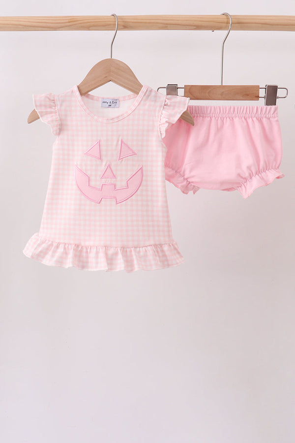 Pink Jack-O-Lantern applique ruffle bloomer set; gingham top 50/50 cotton-spandex and bloomers 95/5 cotton-spandex.