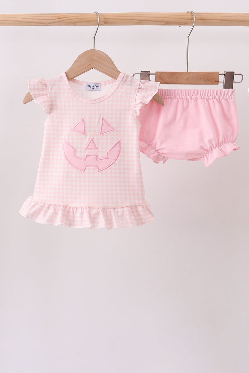 Pink Jack-O-Lantern applique ruffle bloomer set; gingham top 50/50 cotton-spandex and bloomers 95/5 cotton-spandex.