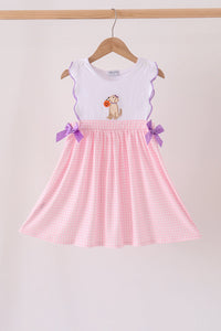 Girl's dress with pink gingham skirt, purple bows, and puppy pumpkin applique on white scalloped top.