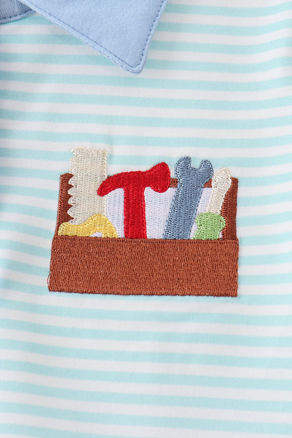 Blue Tool Embroidery Stripe Shirt with light blue stripes and colorful tool embroidery in a brown pocket.
