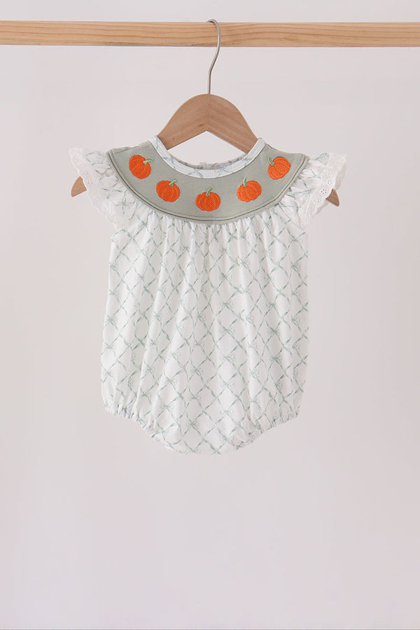 Sage green baby bubble one-piece with embroidered pumpkin collar, white ruffled sleeves, and delicate fall pattern.