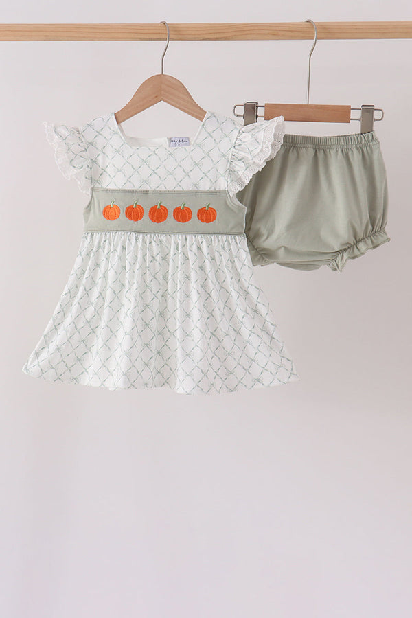 Sage pumpkin embroidery bloomer set with ruffled white dress and matching sage bloomers for autumn.