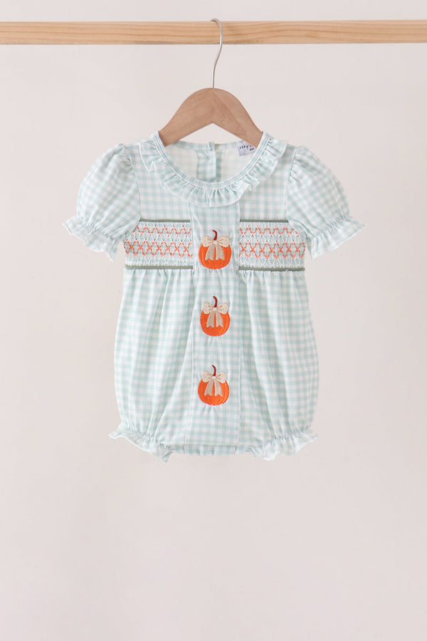 Sage and pumpkin smocked gingham bubble with embroidered pumpkins and ruffled details.