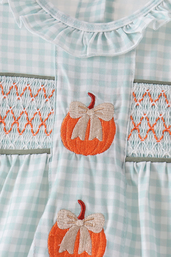Sage and white gingham baby bubble with embroidered pumpkin bodice, delicate smocking, and ruffled neckline for playful fall outfit.