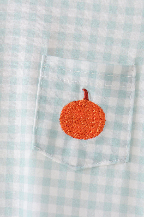 Sage green gingham pocket featuring an orange embroidered pumpkin detail on a soft cotton fall romper.