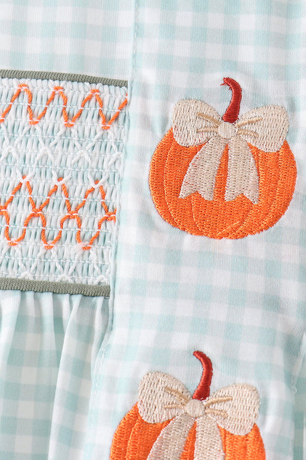 Sage and pumpkin gingham baby bloomer set with hand-smocked elastic waistband and embroidered pumpkin bows with cream ribbons.