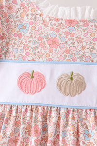 Pink floral fabric with white band featuring embroidered pink and beige pumpkins, bordered by light blue trim for a festive autumn set.