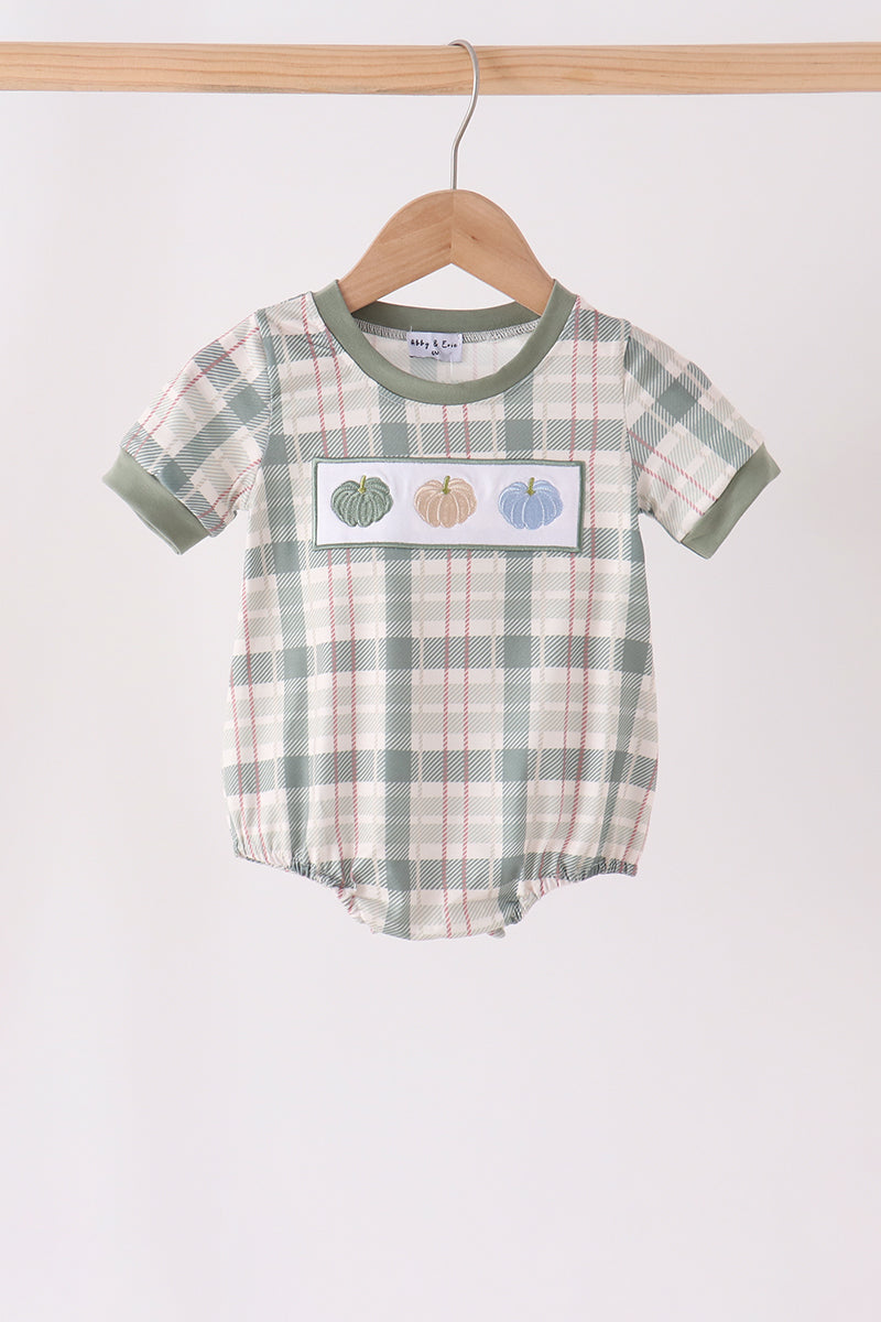 Green plaid baby bubble with embroidered multi-colored pumpkins on front patch, featuring soft green trim and short sleeves for fall.