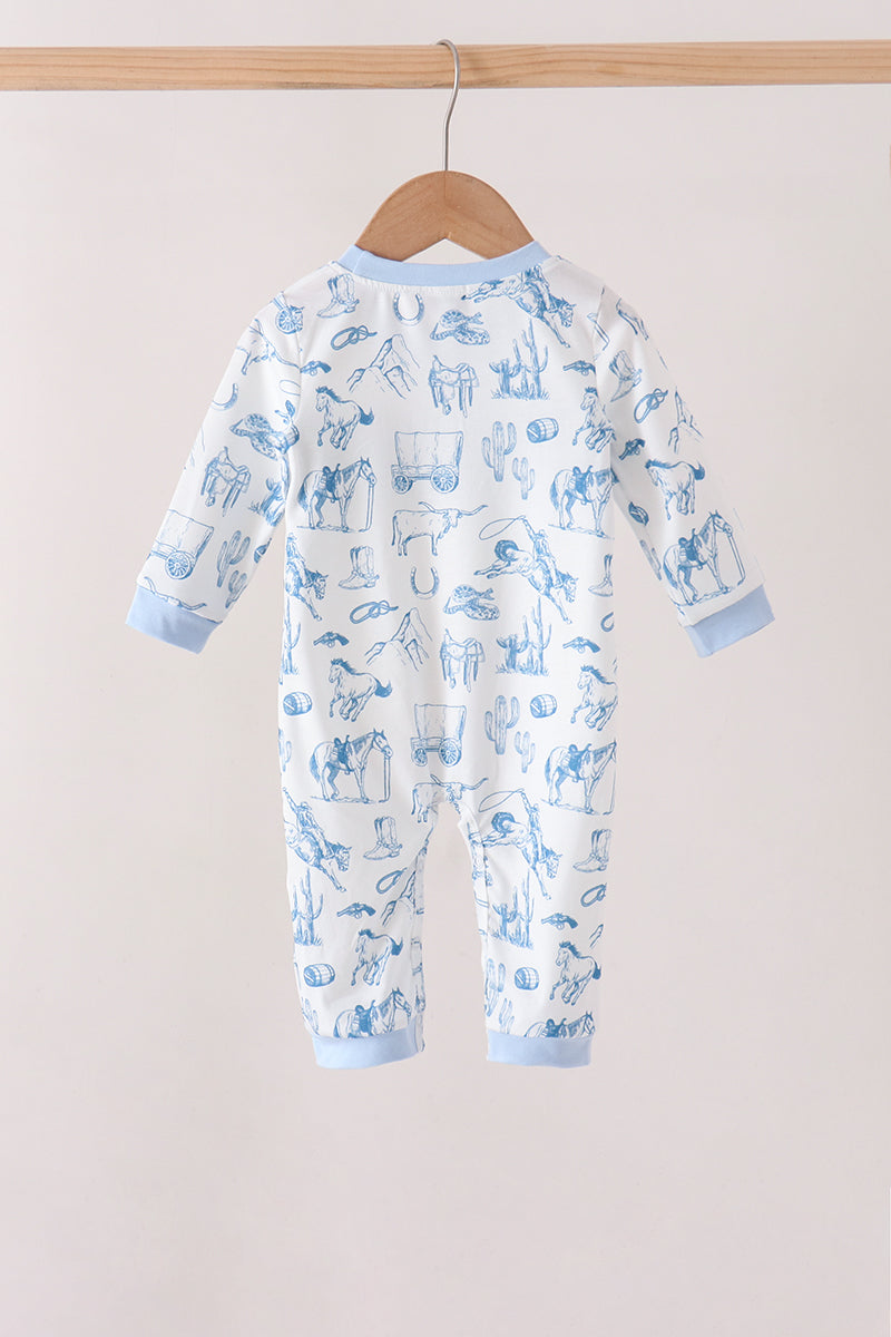 A baby long-sleeve footless jumpsuit hanging on a wooden hanger, featuring a blue animal print on a white background with light blue ribbed cuffs and collar.