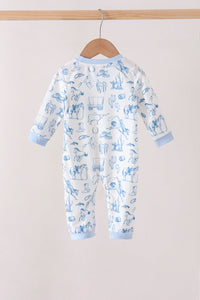 A baby long-sleeve footless jumpsuit hanging on a wooden hanger, featuring a blue animal print on a white background with light blue ribbed cuffs and collar.