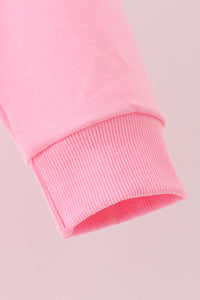 Pink football sequin mom&me top