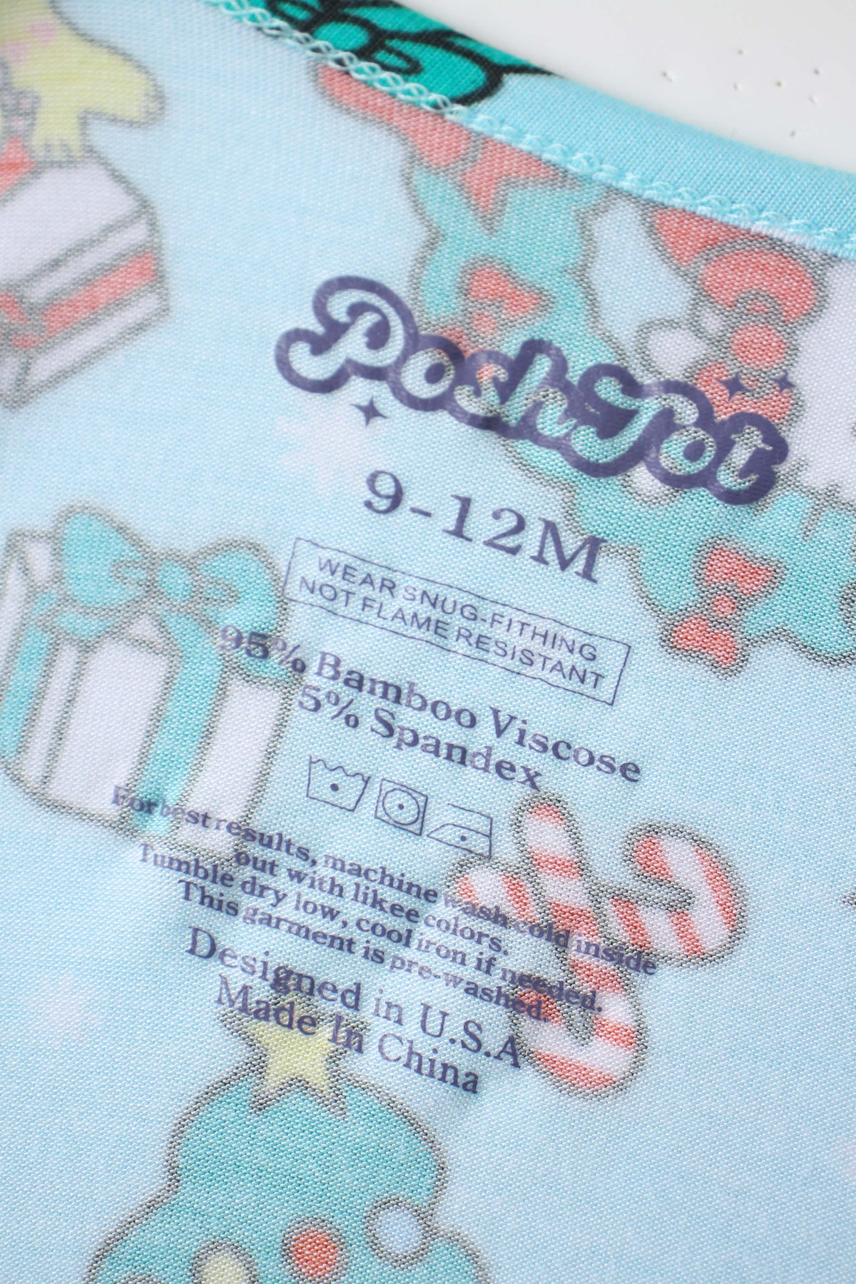 Interior neck label showing PoshTot logo, size 9-12M, and 95% Bamboo Viscose composition