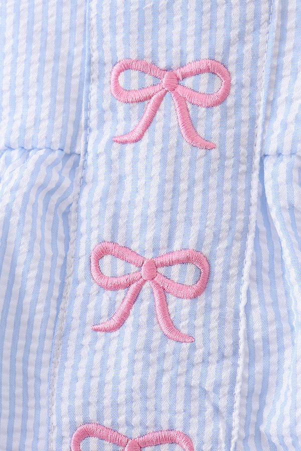 Blue Bow Embroidered Stripe Bubble fabric featuring pink embroidered bows on blue-and-white stripes.