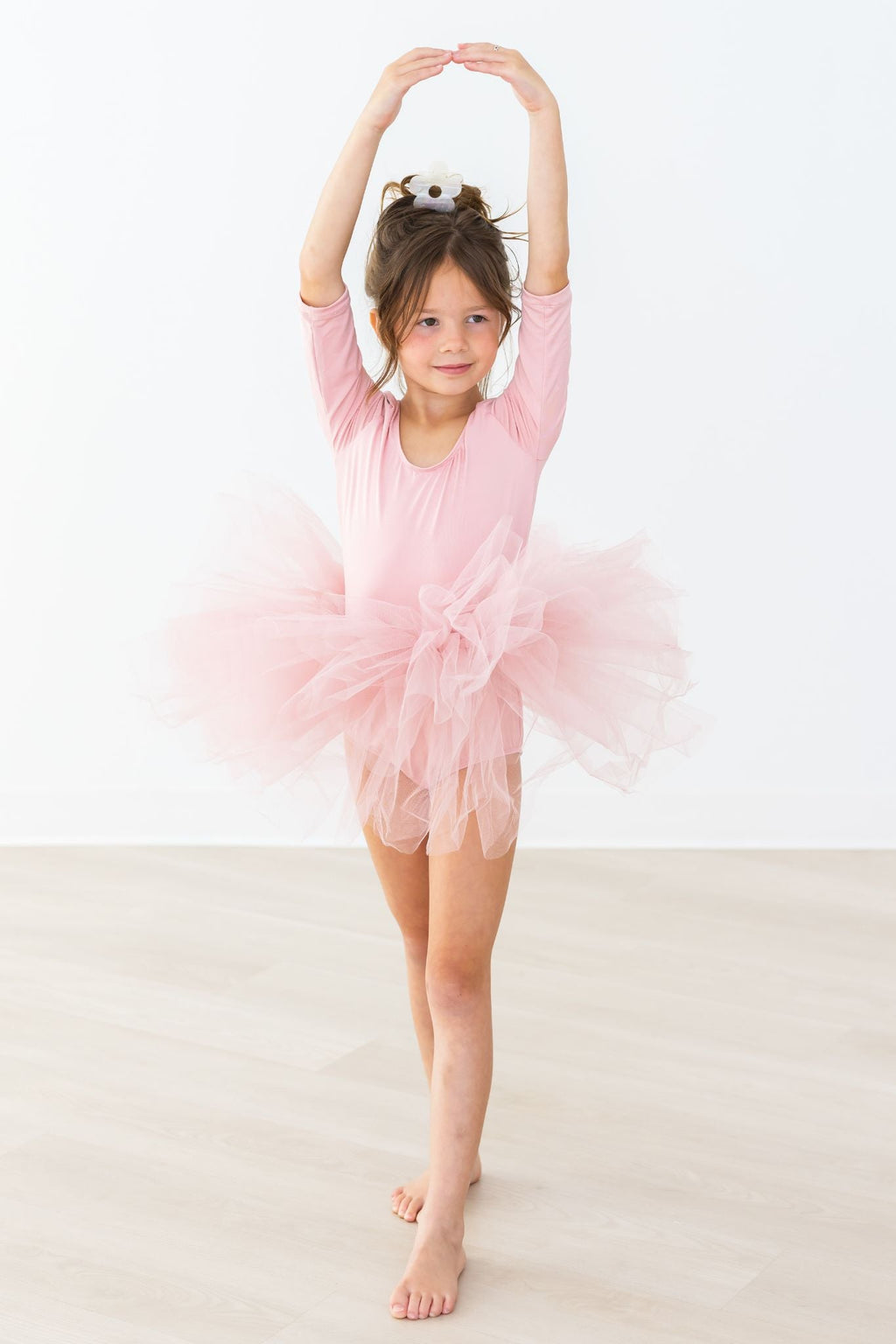 Vintage Pink 3/4 Fluffy Tutu Girls Dance Leotard showcasing fluffy layers perfect for twirling and dancing.