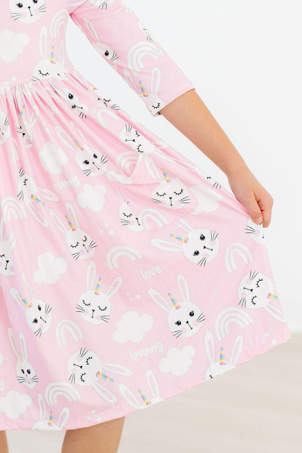 Adorable Bunny Love 3/4 Sleeve Pocket Twirl Dress for Girls by Mila & Rose, perfect for twirling and playful adventures.