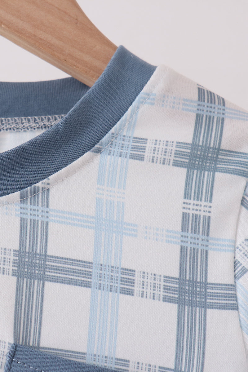 Solid blue ribbed collar seam and Abby & Evie brand tag inside back neck of long sleeve shirt