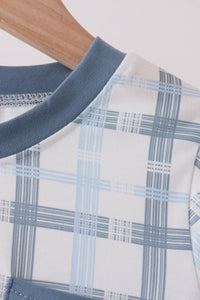 Solid blue ribbed collar seam and Abby & Evie brand tag inside back neck of long sleeve shirt