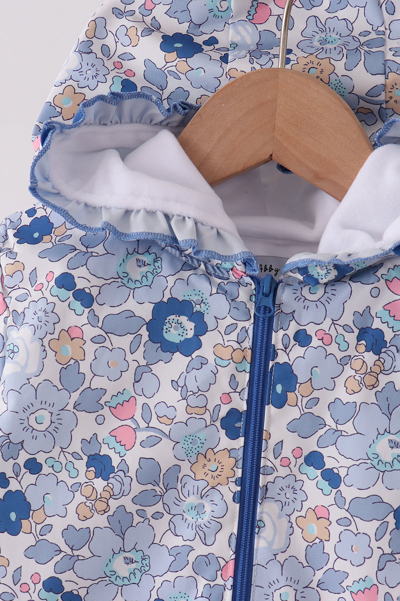 Close-up of hood showing soft white fleece lining and delicate blue ruffle trim inside the collar