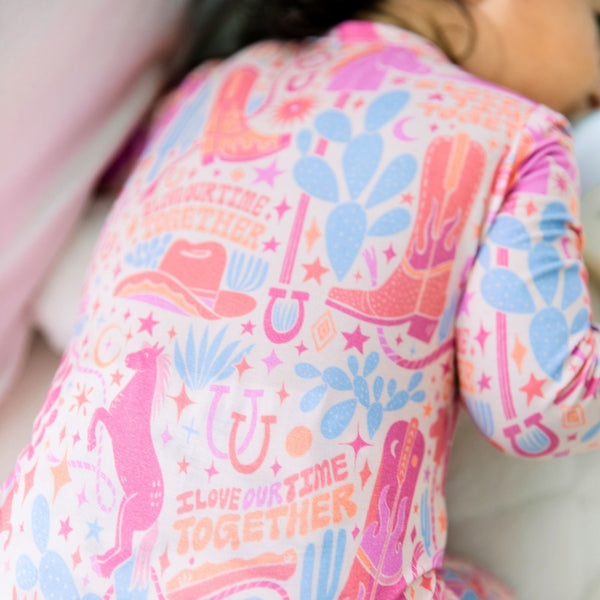 Close-up of the Second-Skin Footless Romper | Saddle Up Western Themed showcasing its soft bamboo fabric, ideal for busy parents looking for a comfortable bamboo baby romper.