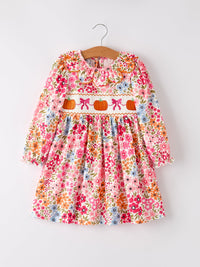 Fall floral dress with pumpkin bow smock embroidery, scalloped collar, and long sleeves.