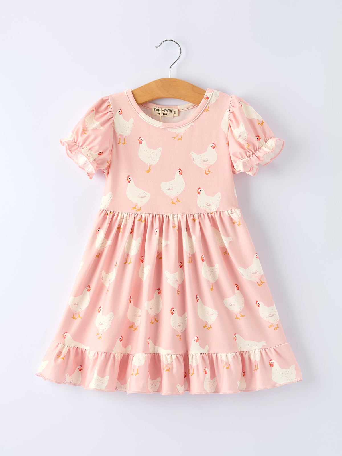 Farm Spring Girls Chicken Print Dress Ruffle In Pink, a delightful addition to any little girl's wardrobe, highlighting fun chicken print.