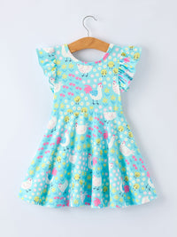 The Aqua Spring Chicken Floral Farm Print Dress for Girls laid flat on a colorful background, emphasizing its vibrant print.