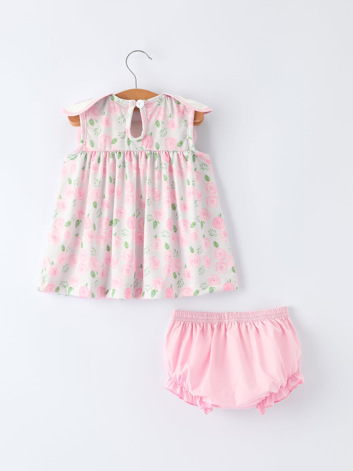 Petal Peter Pan collar floral smocked bishop dress and pink bloomers set for baby girl.