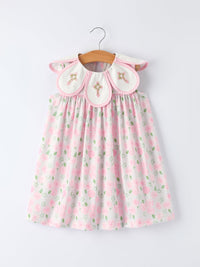 Floral smocked petal Peter Pan collar dress for girls with pink rose print, white background, and pink trim.