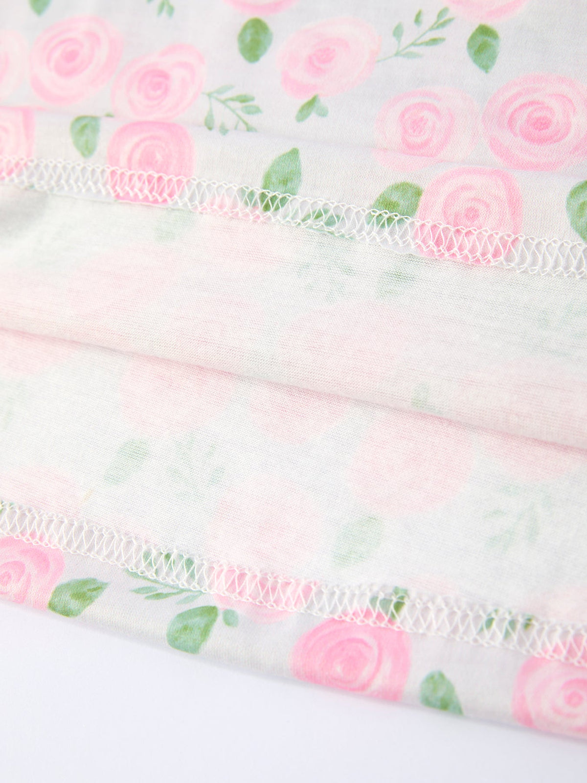 Floral Smocked Petal Peter Pan Collar Dress fabric: pink rose print, delicate stitches, soft breathable material.