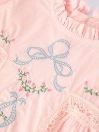 Versatile Embroidered Lace Girls Short Sleeve Dress in soft beige, suitable for both casual playdates and elegant outings.