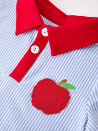 Red polo collar and placket with white buttons on blue striped shirt featuring an apple applique.