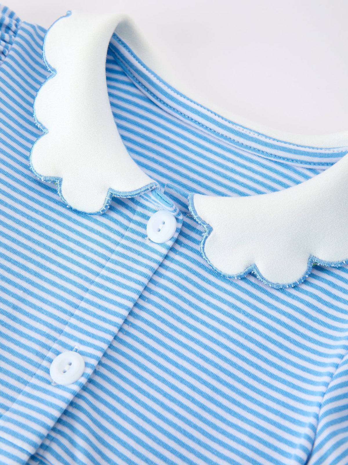 Close-up of the stylish Petals Collar on the Girls Back To School Pencil Dress Petals Collar Pocket Applique, highlighted with blue stripes.