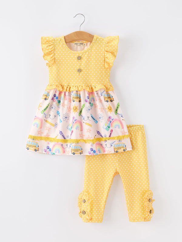 Girls Back To School Rainbow School Bus Ruffle Dress Leggings Set featuring a yellow polka-dot dress with ruffles and colorful prints, paired with matching leggings.