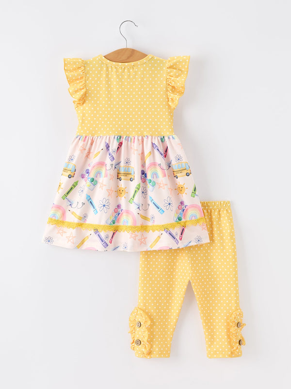 Reverse view of the Girls Back To School Rainbow School Bus Ruffle Dress Leggings Set showing the playful design with school-related graphics on the dress and leggings.