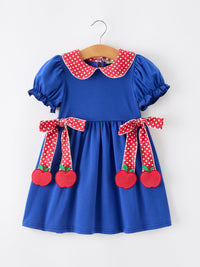 Blue girls' dress with red polka-dot collar and apple-applique bows for back-to-school.