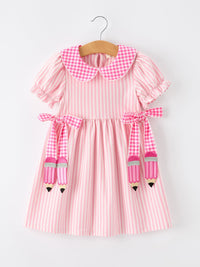 Girls back-to-school pink plaid petals collar dress with pencil applique bows.