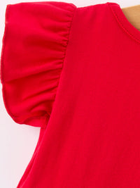 Close-up of red Girls Back To School Pencil Twirl Dress with puff sleeve and ruffle trim.