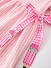 Pink striped dress for girls with petals collar, pink plaid trim, and pencil applique bows.