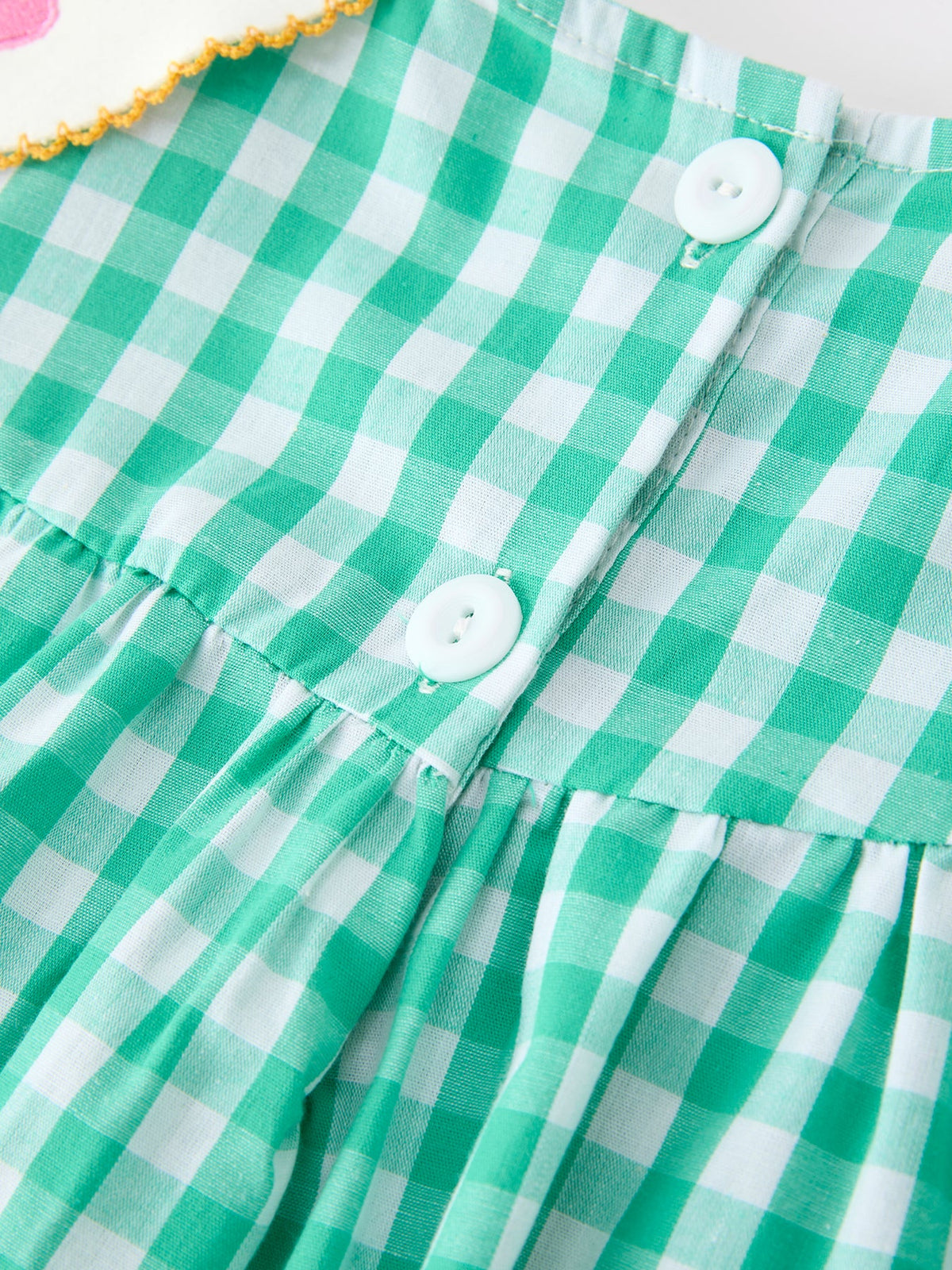 The adorable puff sleeves of the Back to School Apple Pencil Applique Girls Dress, making it a cute and fashionable back to school dress for girls.