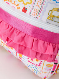 Back to School Print Girls Backpack Ruffle Bag with pink ruffle trim and colorful school-themed pattern.