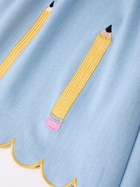 Blue dress with pencil applique embroidery, puff sleeves, and scalloped hem.