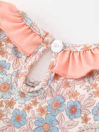 Fall floral girls dress with smocked bodice, pink ruffle neckline, bow accents, back neck button.