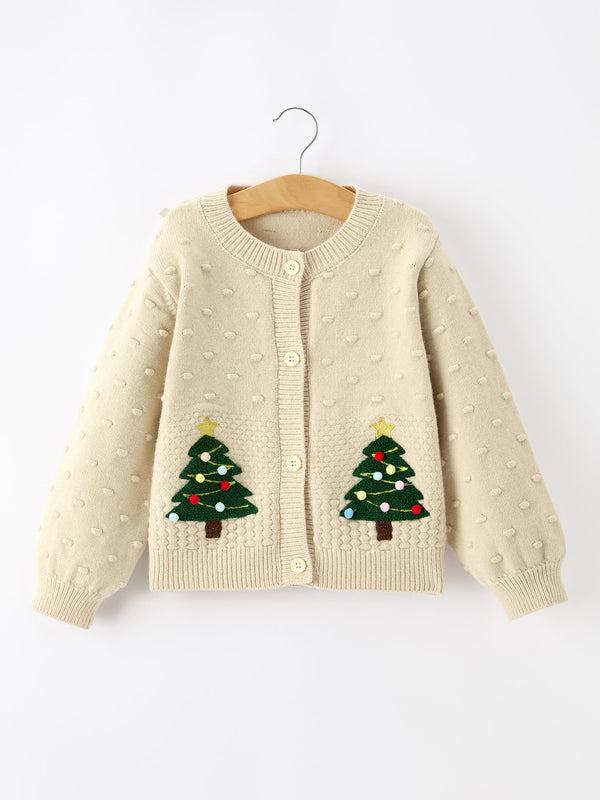 Beige kids knit cardigan with festive Christmas tree appliqués and colorful ornaments on front pockets. Button-front holiday sweater.