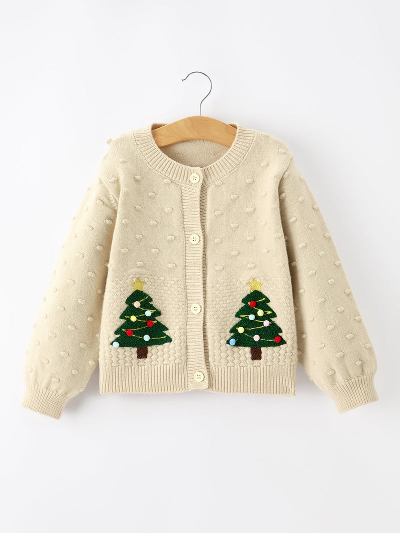 Beige kids knit cardigan with festive Christmas tree appliqués and colorful ornaments on front pockets. Button-front holiday sweater.