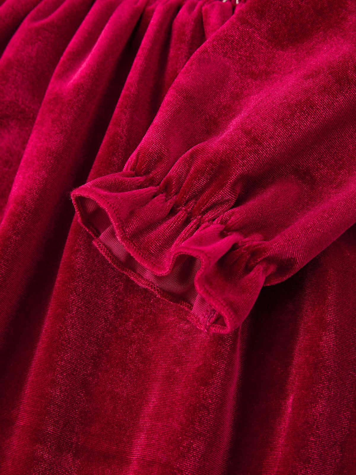 Burgundy velvet Girls Party Dress with puff sleeve ruffle and smocked waist pearl detail for Holidays.