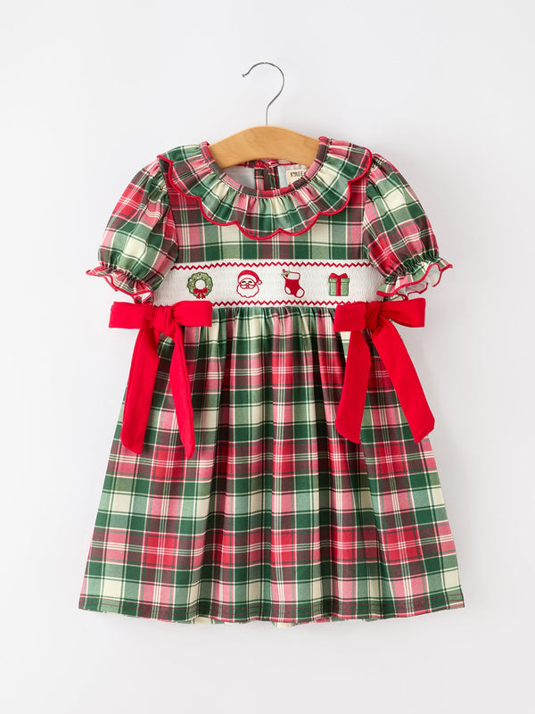 Girls Christmas plaid dress with ruffle collar, embroidered holiday icons, puff sleeves, and red side bows.
