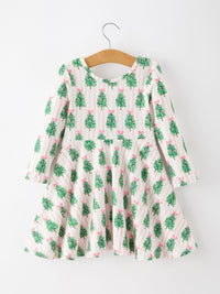 Girls pink striped twirl dress with green Christmas tree print and pink bow accents, featuring long sleeves and a flirty skirt.